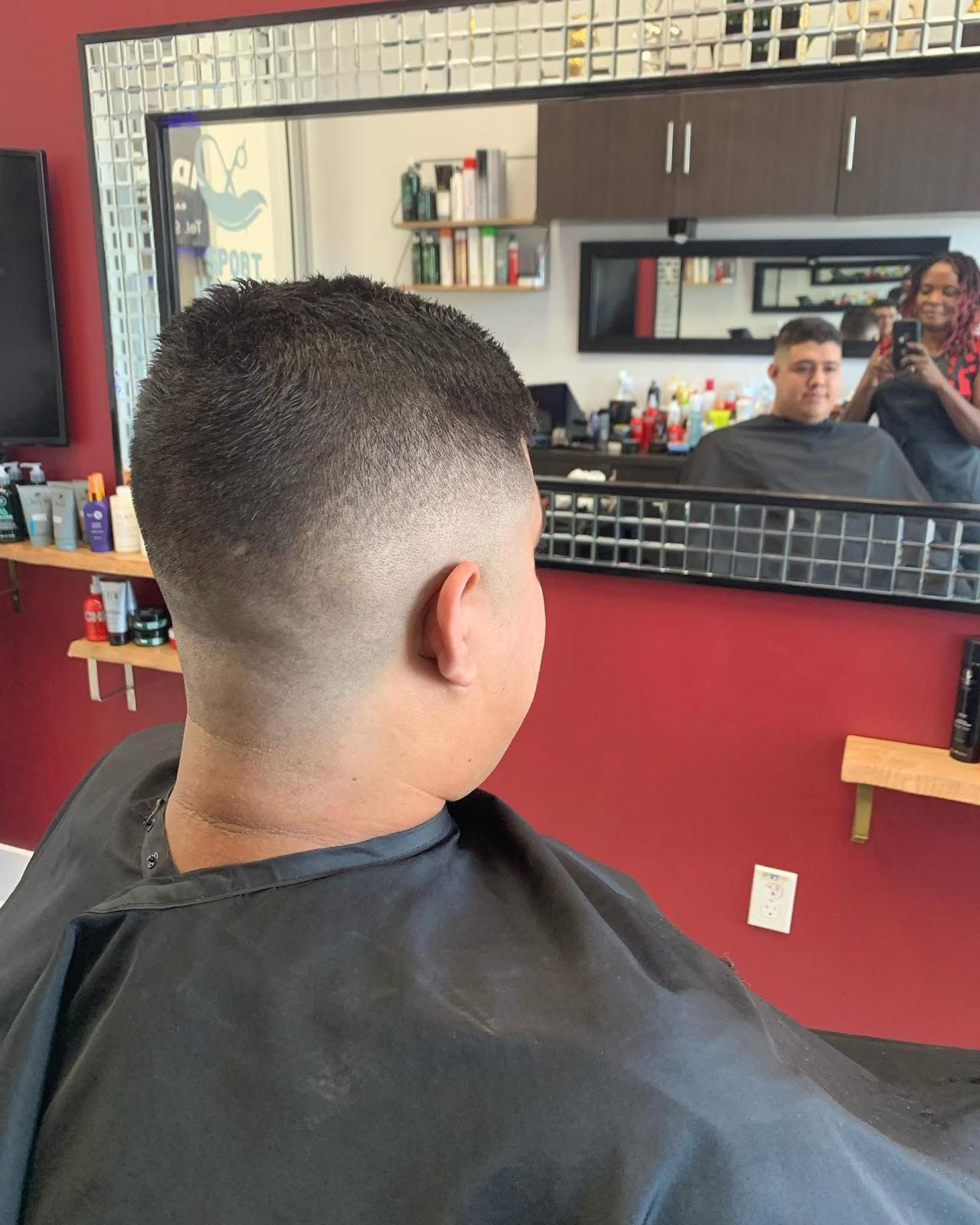 Client with a fresh skin fade haircut at Sport Haircuts